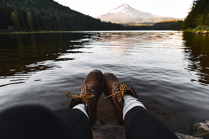 person on river with only feet showing