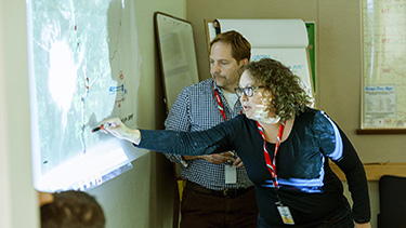 Two people consulting on a project