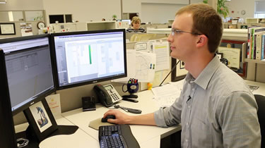 Staff worker at computer