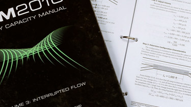 Highway Capacity Manuals with mathematical diagrams