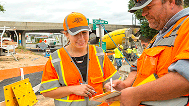 Workers complete a checklist