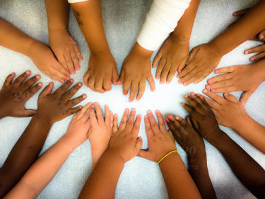 Licensing image: hands of children