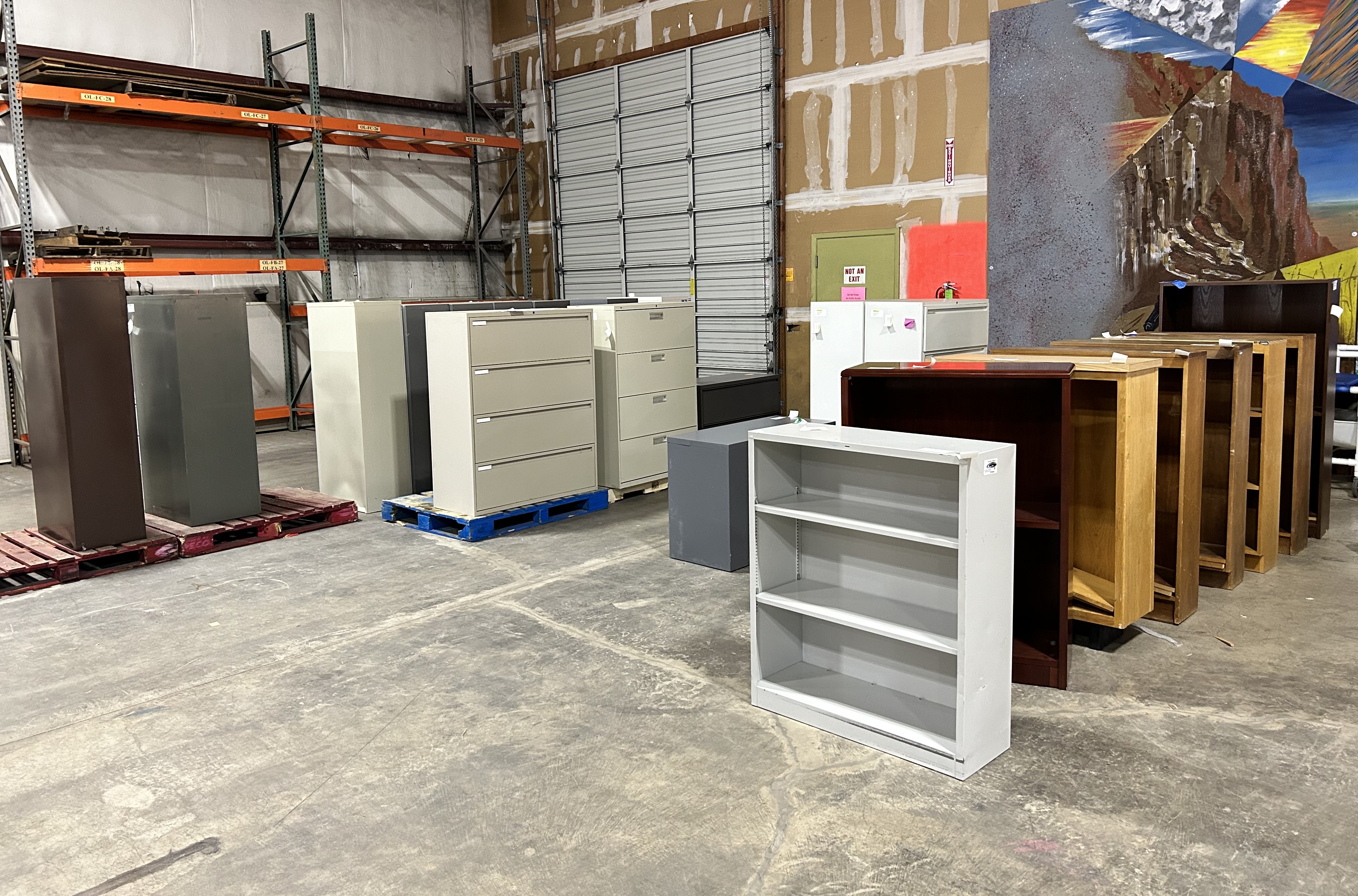 Row of bookcases and file cabinets