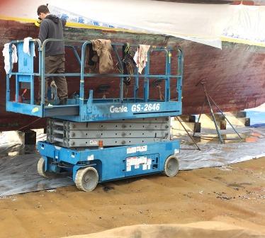 A blue scissor lift