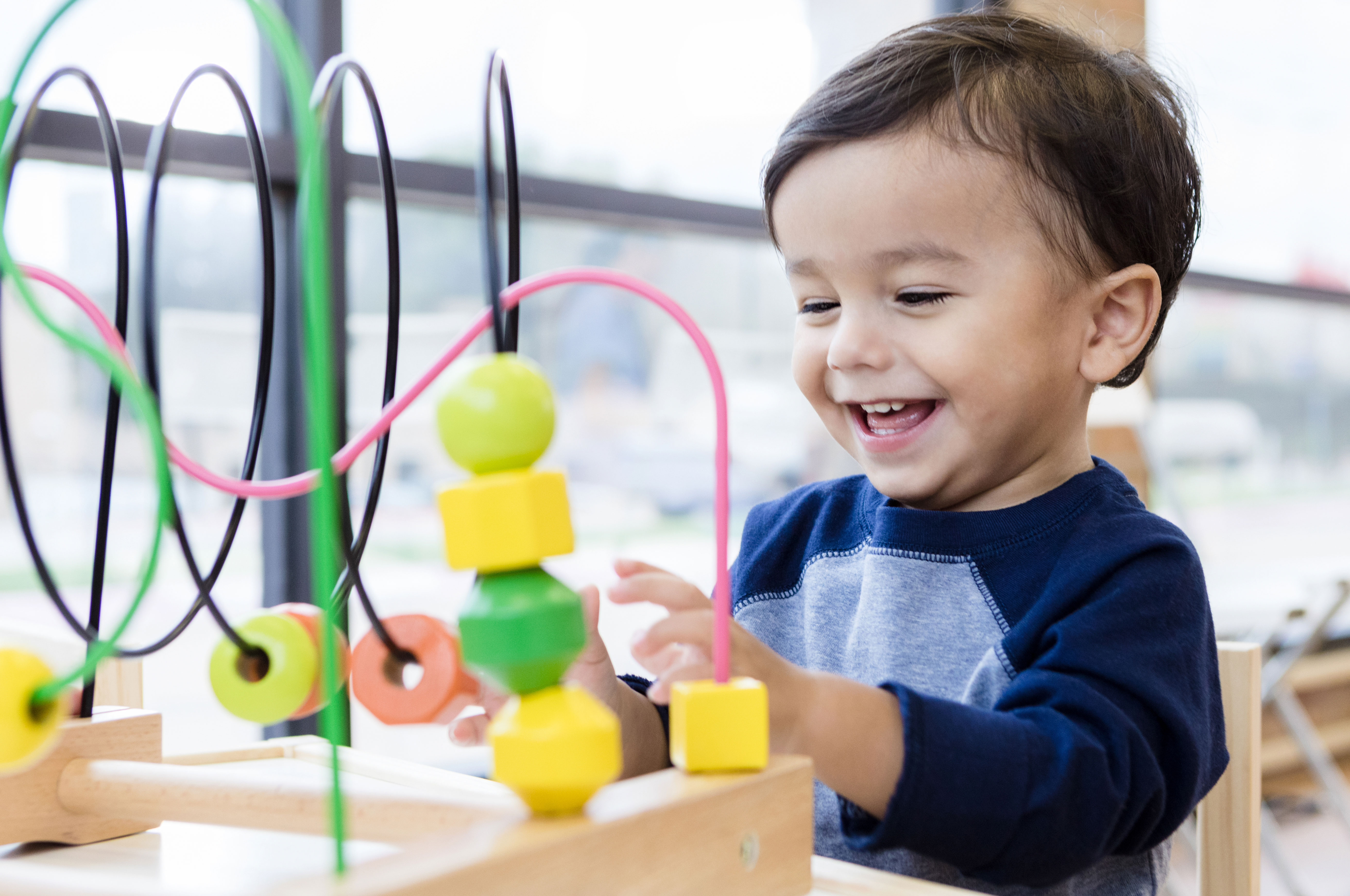 toddler playing with blocks
