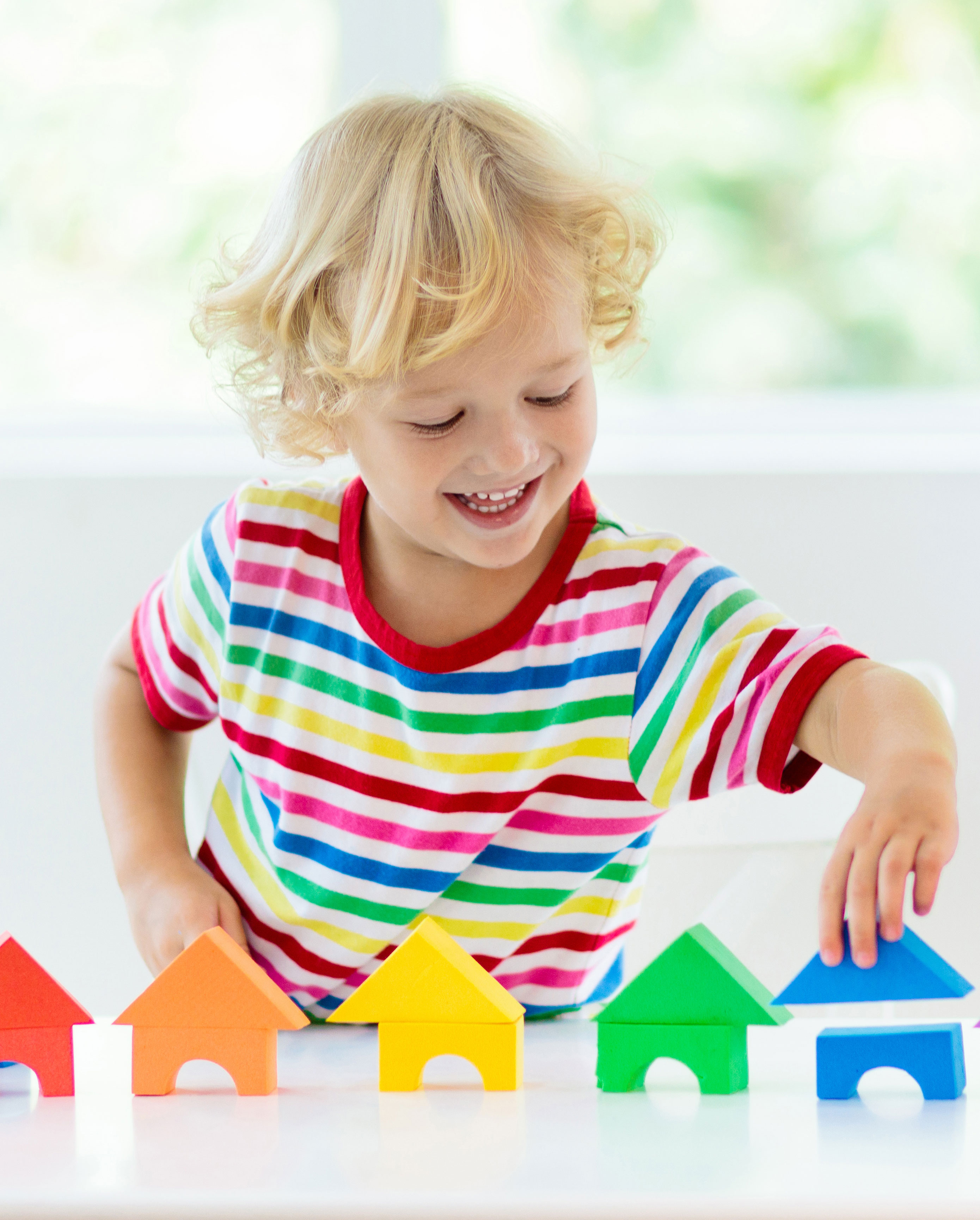 child playing with blocks