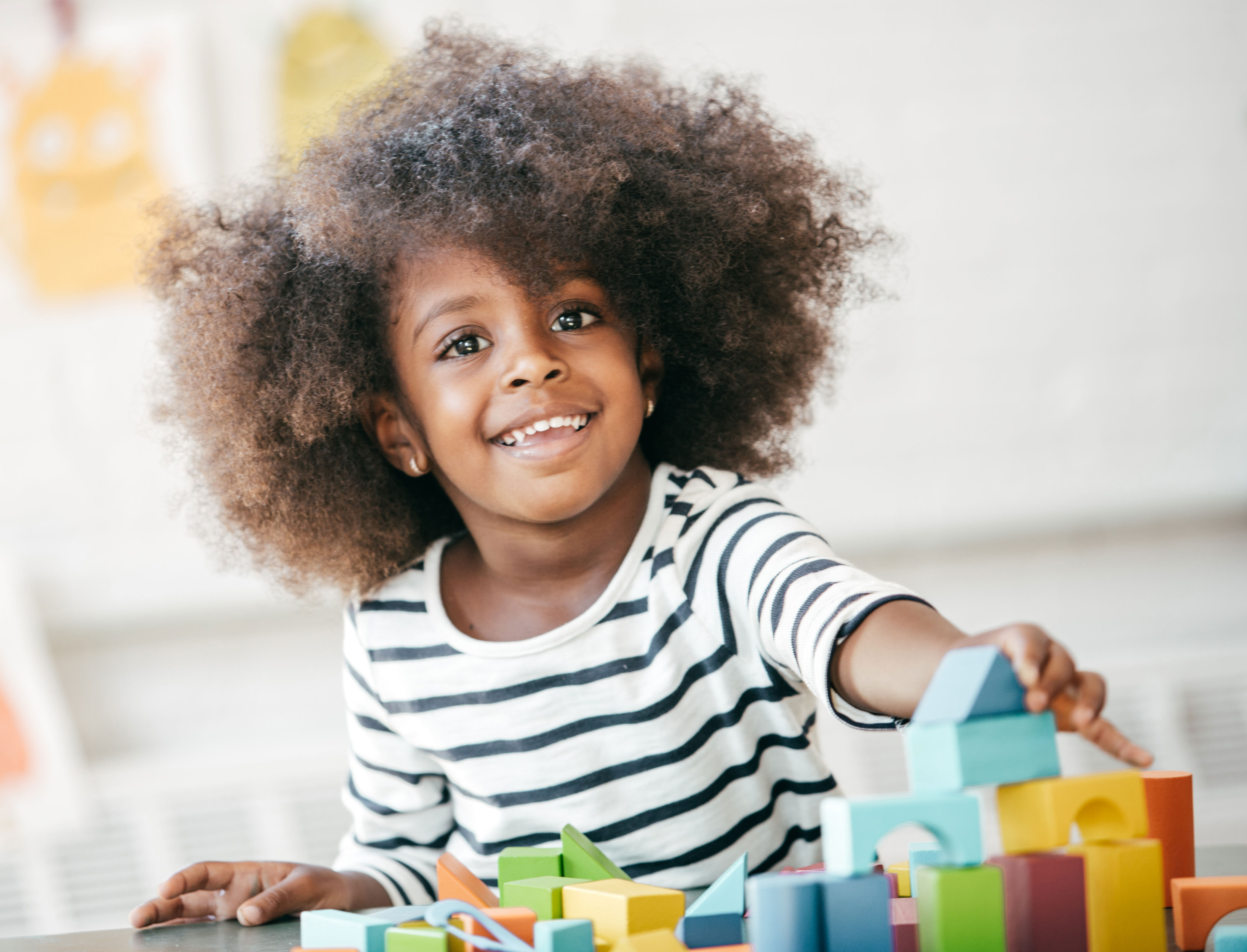 child playing with blocks