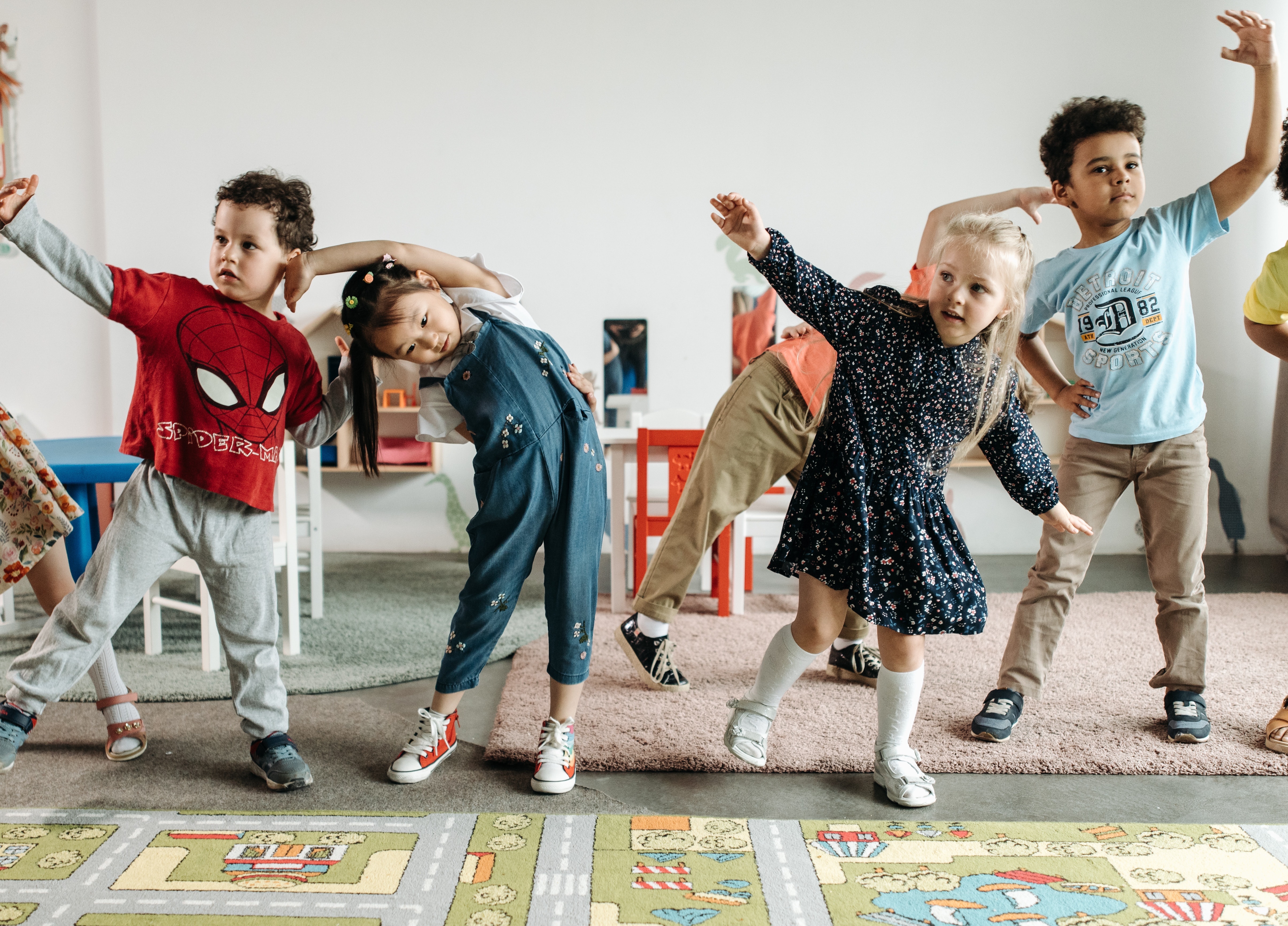 kids stretching in classroom