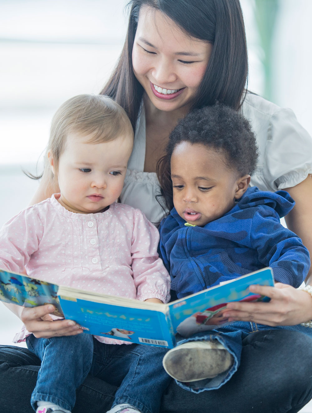 woman reading to children