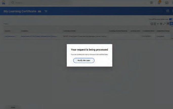 Workday screen with a pop up box that states your request is being processed the box includes notify me later button