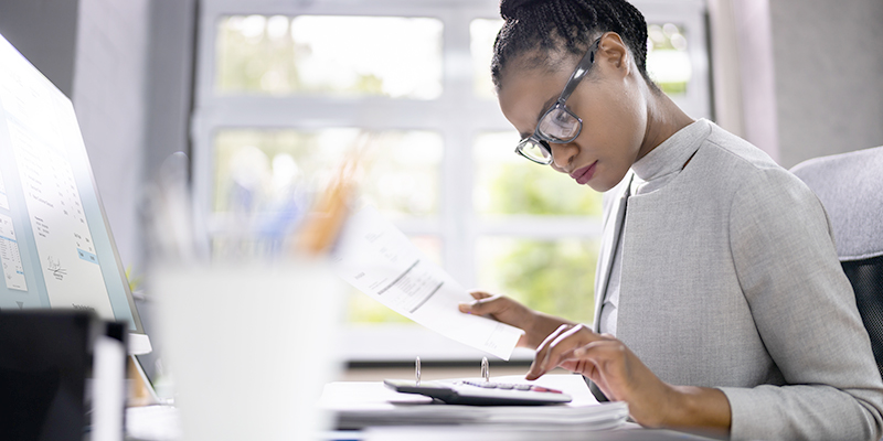 Woman on calculator