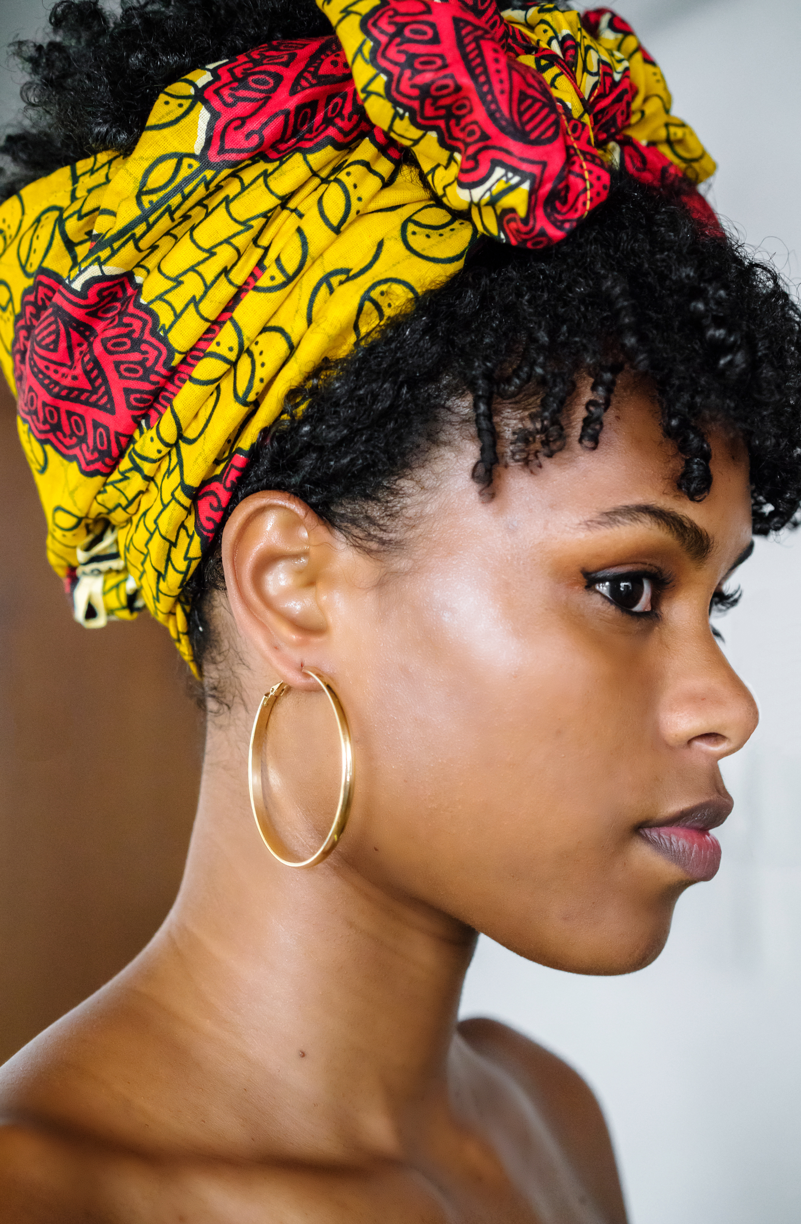 Young woman with hair wrap