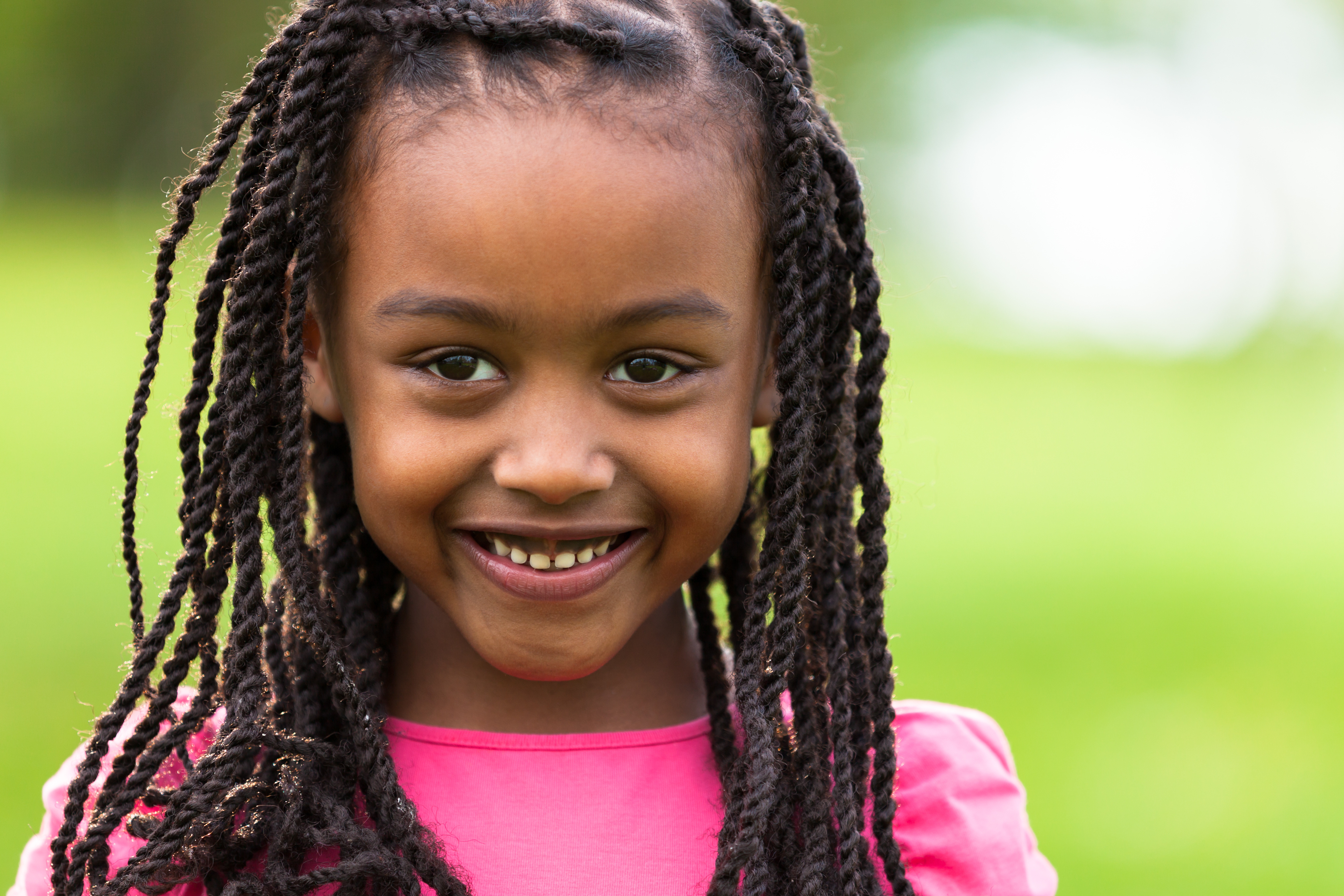 Young girl with locs