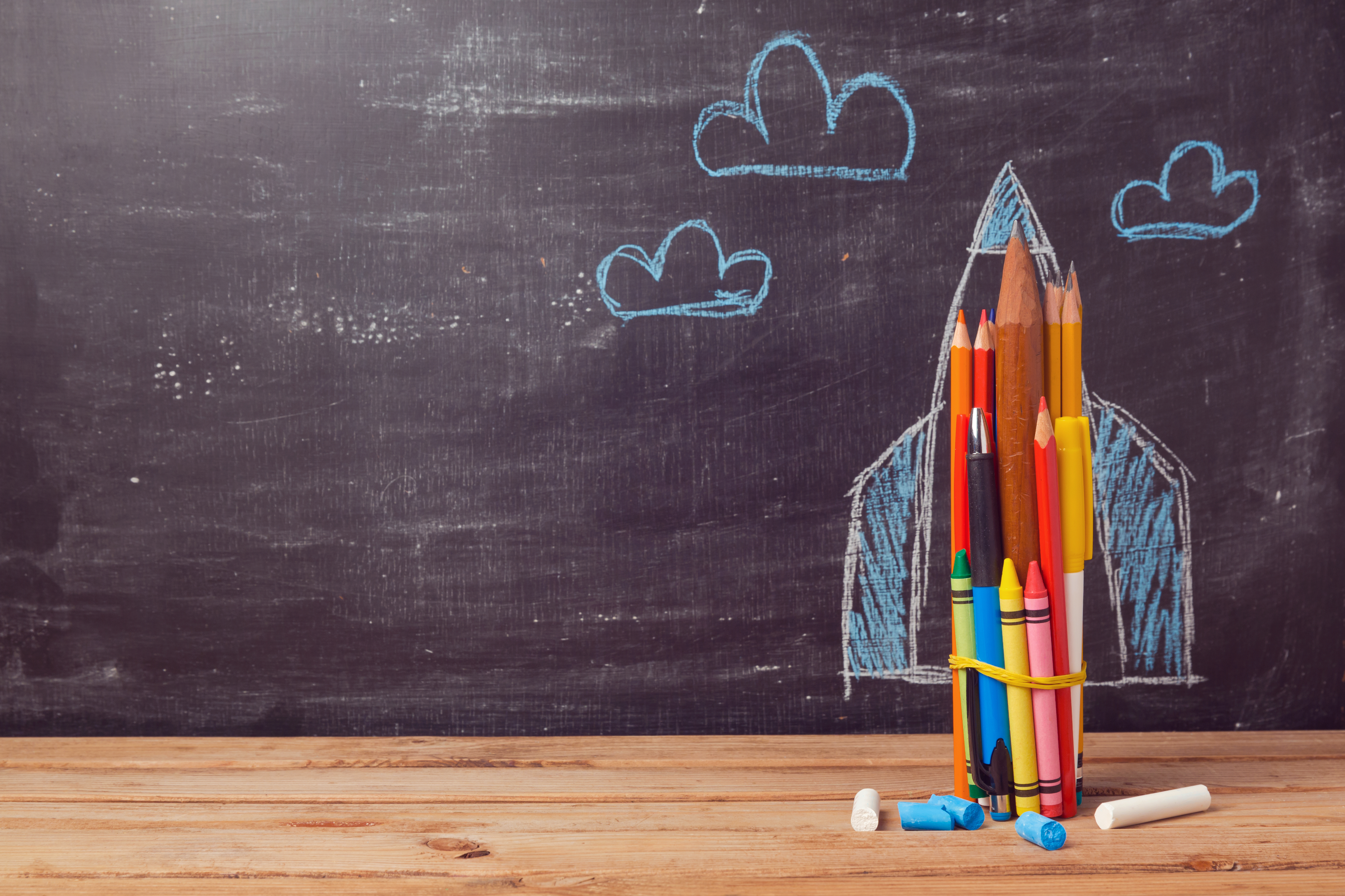 group of pencils in shape of rocketship