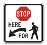 stop here for pedestrians sign