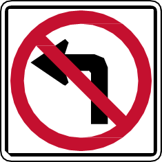 Señal prohibe el cruce pronunciado a la izquierda