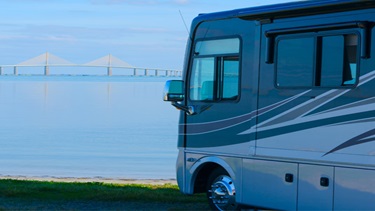 RV in front of ocean and beach