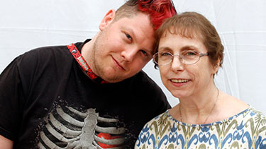 son and mother hugging