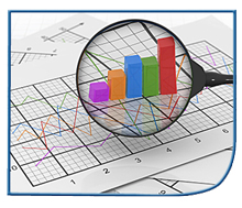 Magnifying glass being used to examine a colorful bar chart