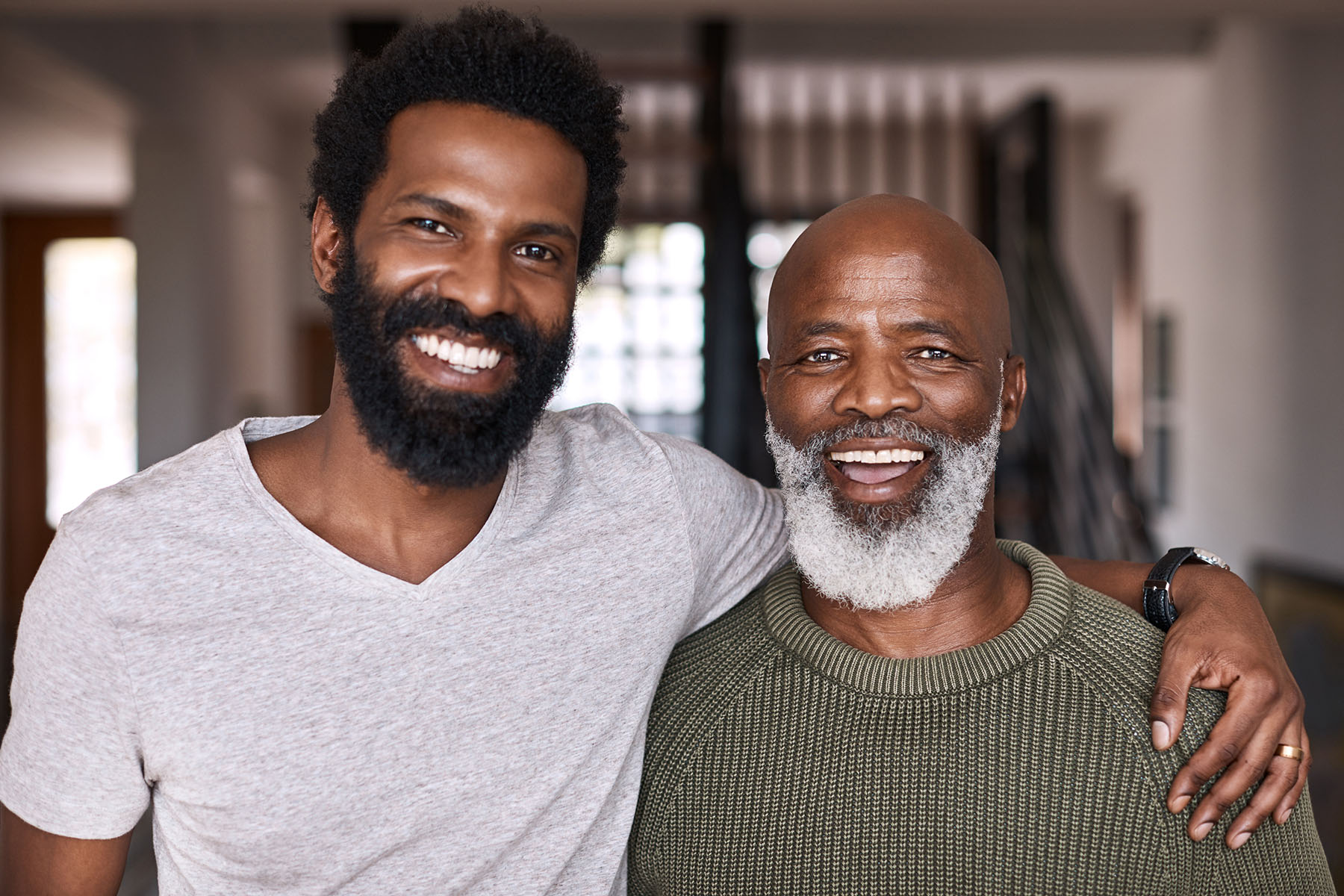 My dad is my hero Portrait of a happy young man relaxing and spending time with his father at home black family stock pictures, royalty-free photos & images