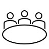 3 people around an oval table