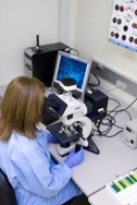 Woman at Microscope
