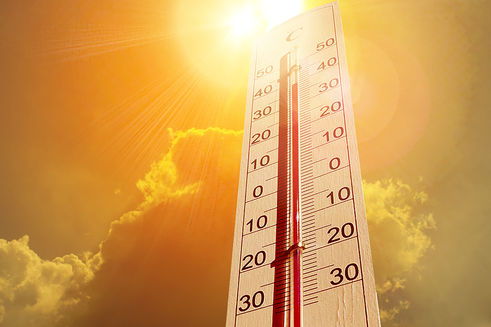 hot sun and thermometer