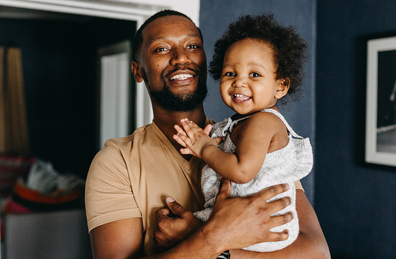 man holding small child