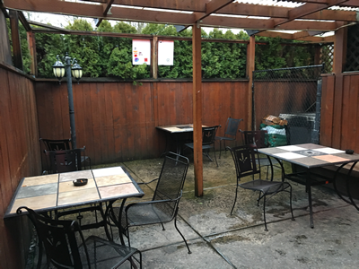 Patio with a ceiling and three encosed walls