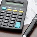 calculator and pen on desktop