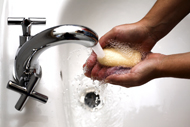 washing hands in sink