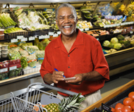 man buying vegetables