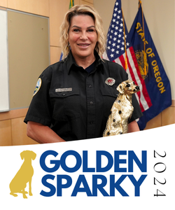 Kim Kosmas holding her award.