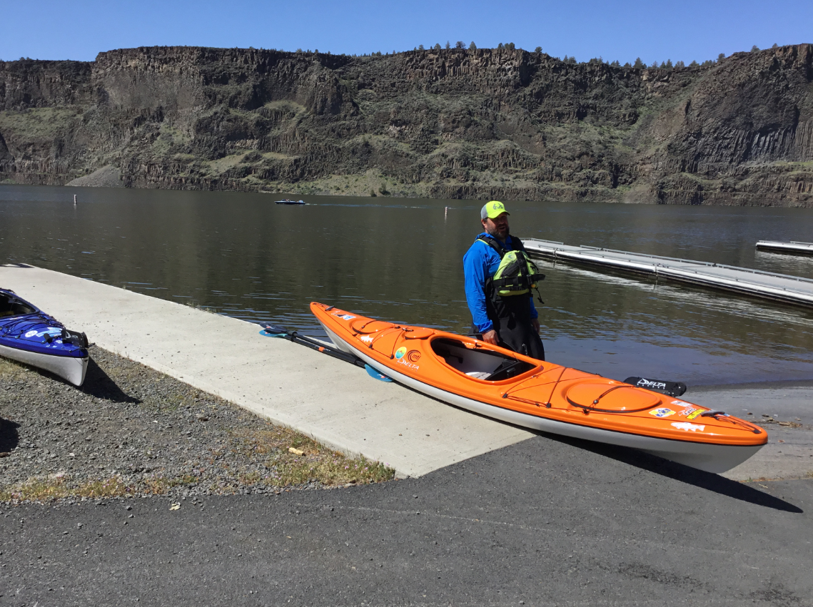 Kayaker preparing to launch when no other trailered boats are launching