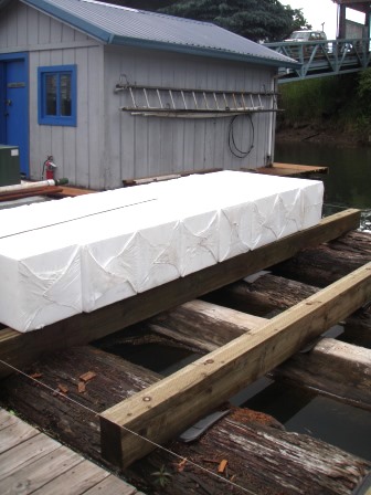 Benefits from encapsulating foam for dock flotation
