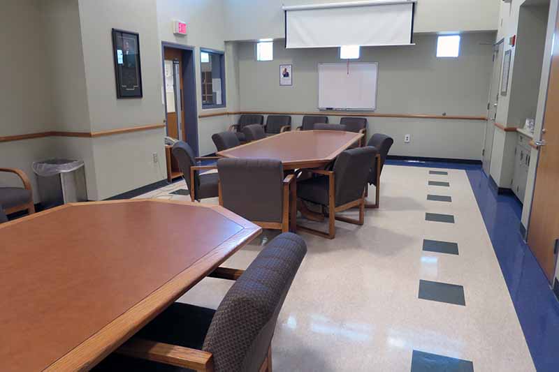 tables and chairs in a room