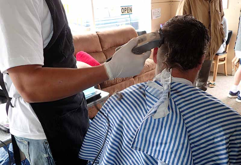 barber cutting hair