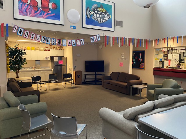 day room with couches and TV
