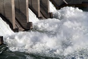water flowing through a dam