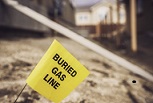 Buried gas line flag in ground