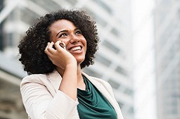 Woman on cell phone in city